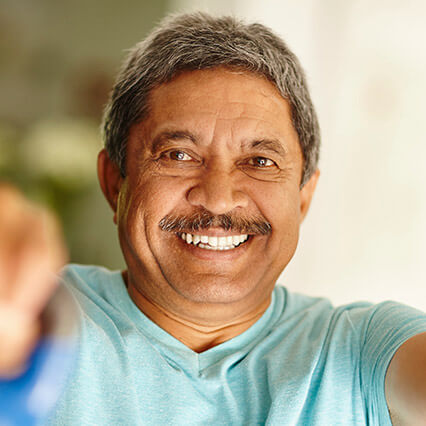 man smiling bright